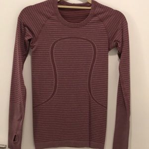 Slightly worn long sleeve top.